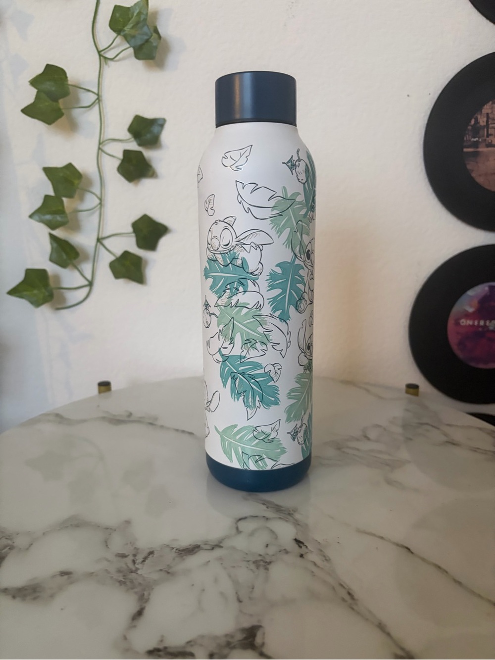 Disney White Bottle with Teal and Light Green Leaf Print